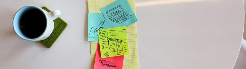 Post-it notes with sketches of a laptop computer, a pencil and paper, an open book, and a complicated interface. School software is the last thing on our list of things that need to be redesigned.
