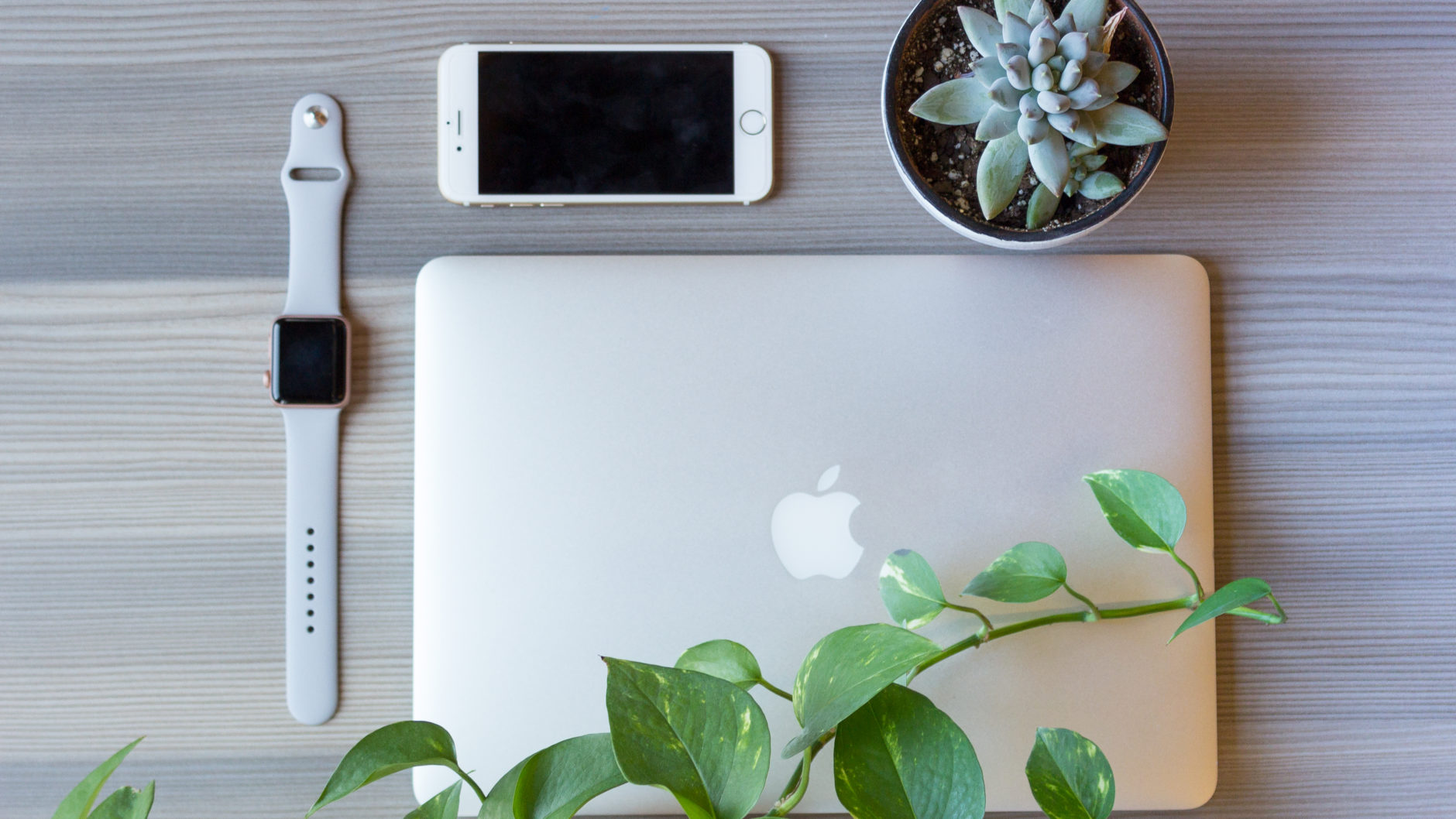 A user's desk representing someone with the need for calm technology in their enterprise web application UI design