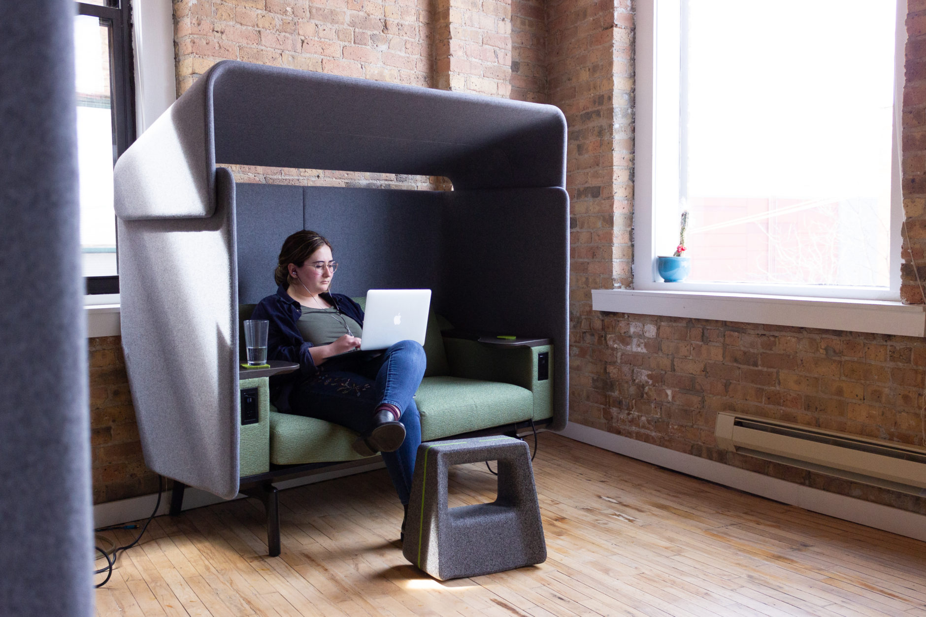 Practical Checklist for Ethnographic Research - designer sitting on couch with laptop